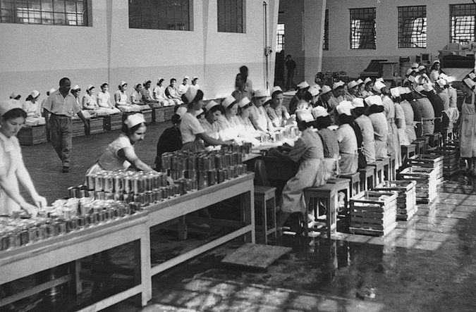 women-working-in-old-canning-production-line